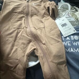 Baby item bundles includes Nike one piece bibs socks hats and more 6-9 months